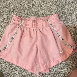 Pink Nike shorts